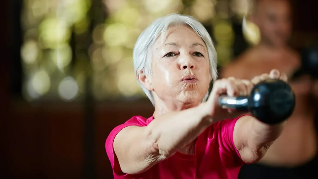 Person performing arm exercises with dumbbells Ramsgate
