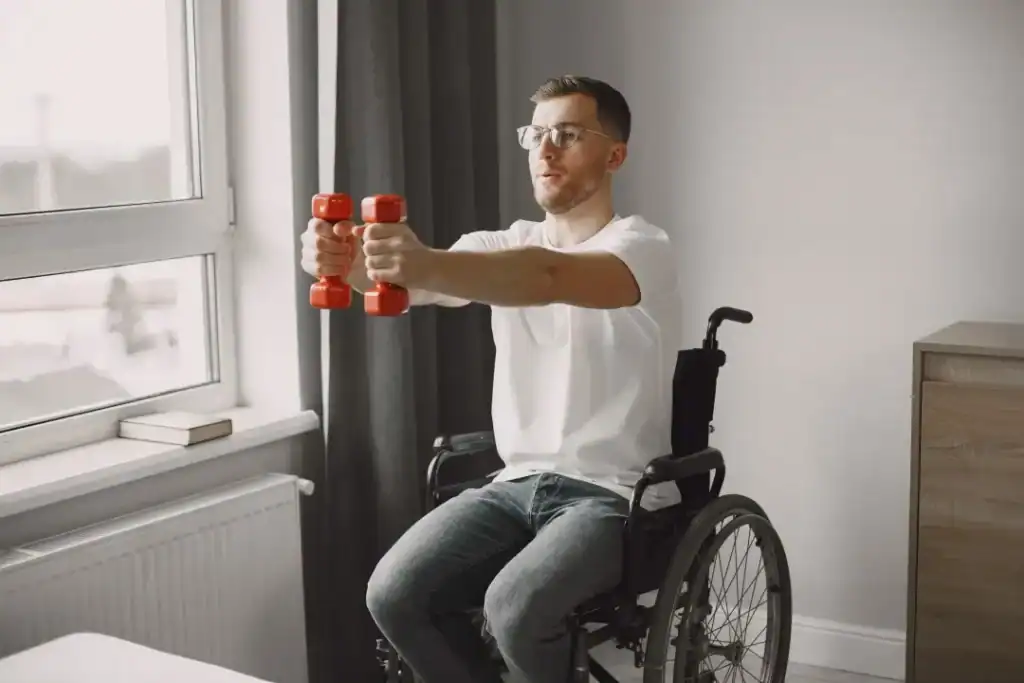 Image of man doing exercise in his wheelchair to aid weight loss Ramsgate